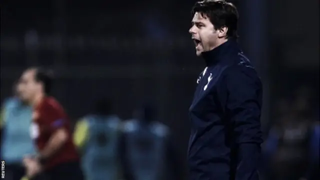 Mauricio Pochettino looks on from the touchline