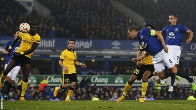 Phil Jagielka scores a header