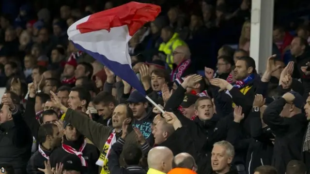 Lille fans celebrate in the stands