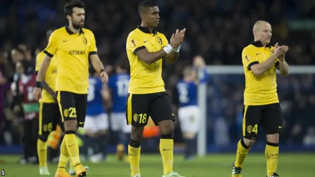 Franck Beria and his teammates applaud the fans at full-time