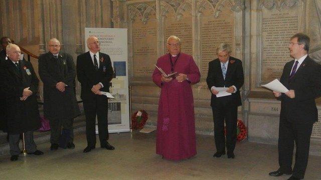 Lord Eames, former Church of Ireland Primate, conducts the commemoration service for Captain Arthur O'Neill at Westminster