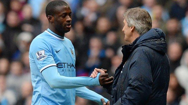 Yaya Toure and Manuel Pellegrini