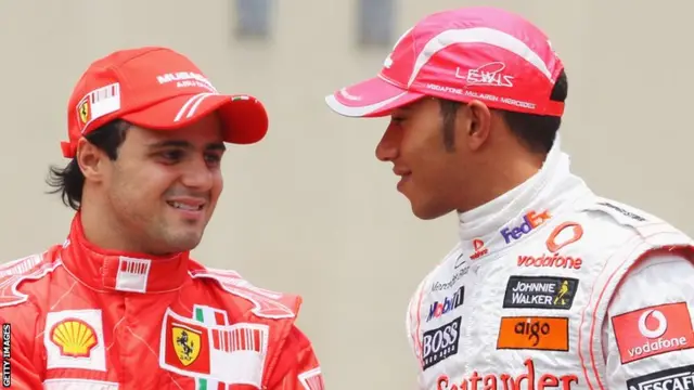 Felipe Massa (Left) of Brazil and Ferrari and Lewis Hamilton (Right) of Great Britain and McLaren Mercedes shake (shakes, shaking) hands at the drivers end of year photo session prior to the Brazilian Formula One Grand Prix.