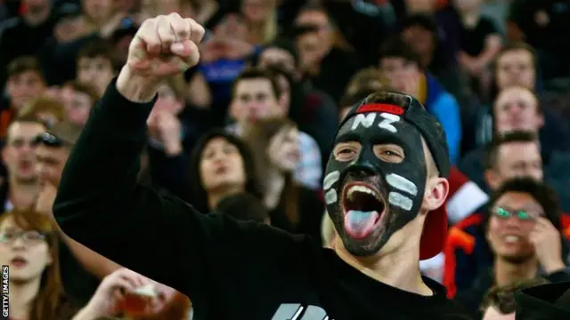 A New Zealand fan celebrates