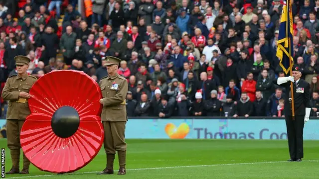 A minute's silence is held at Anfield