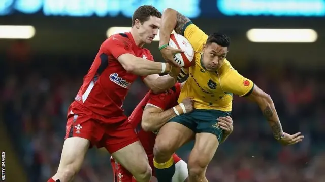 Wales and Australia battle for the ball