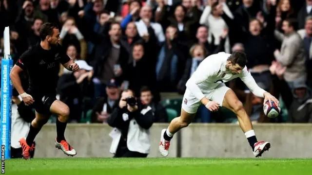 Jonny May scores