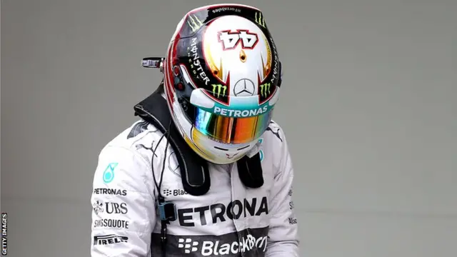 Lewis Hamilton of Great Britain and Mercedes GP looks on after qualifying for the Brazilian Formula One Grand Prix at Autodromo Jose Carlos Pace on November 8, 2014 in Sao Paulo, Brazil.