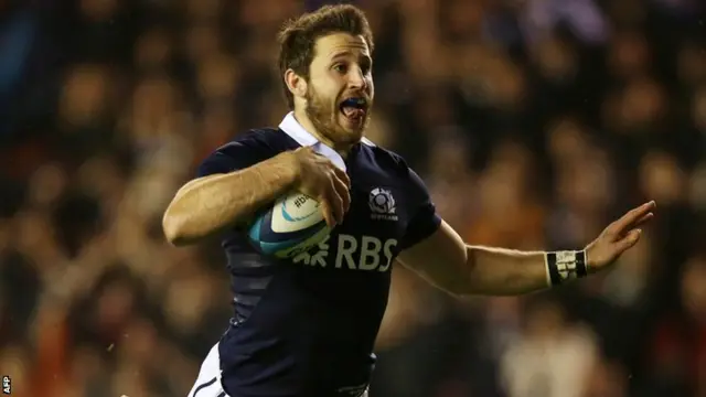 Tommy Seymour dives for the try