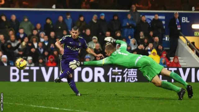 Sergio Aguero scores his side's second goal