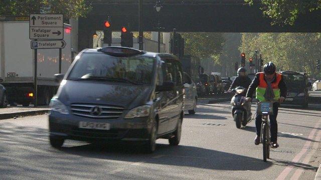 Cyclist on Embankment