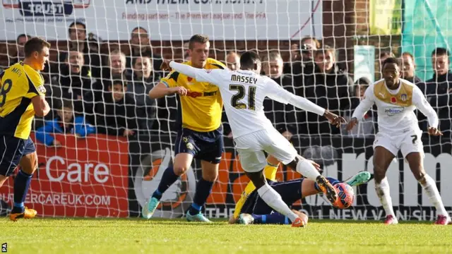 Colchester's Gavin Massey scores