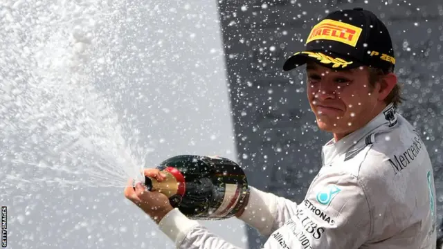 Nico Rosberg sprays champaigne after winning the Brazilian Grand Prix