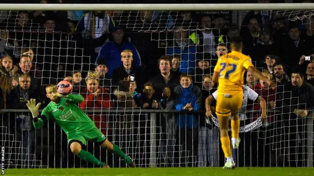 PNE's Callum Robinson beats the keeper from the penalty spot