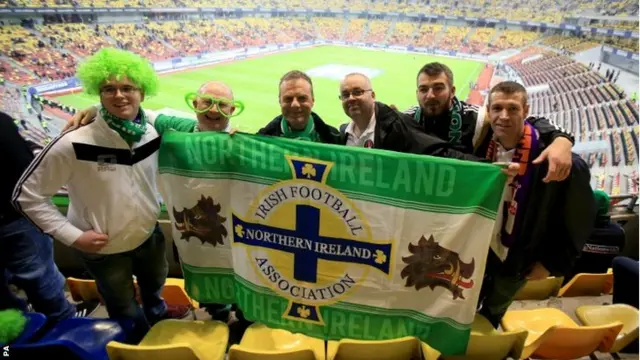 Northern Ireland fans with a flag