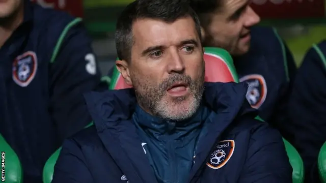 Roy Keane looks on from the bench