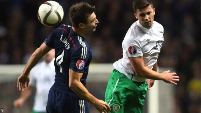 Shane Long heads goal wards