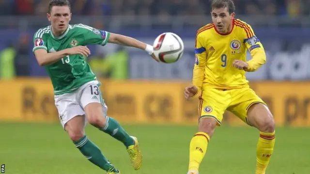 Corry Evans watches the ball