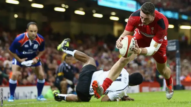 Alex Cuthbert of Wales scores a try v Fiji