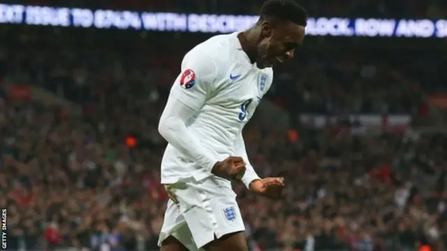 Danny Welbeck celebrates his second goal