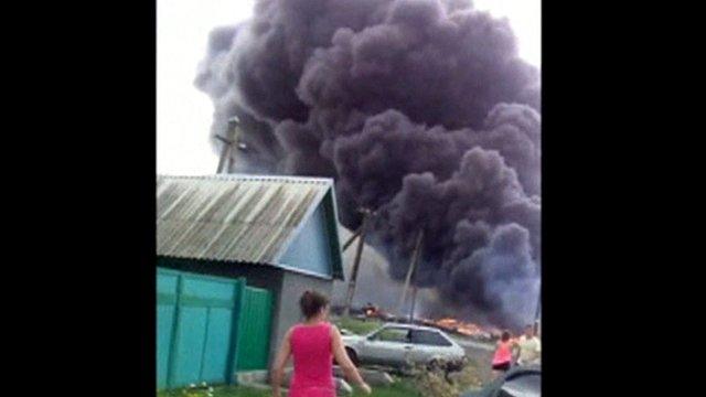 Smoke plumes rise after MH17 crash