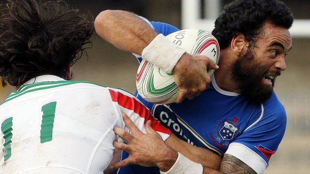 Samoa's Kahn Fotualii in the match against Italy