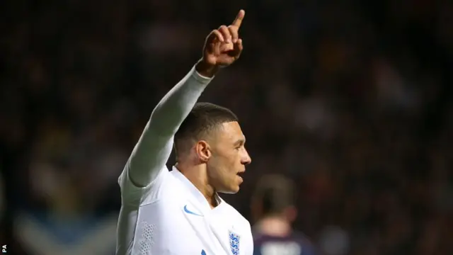 Alex Oxlade-Chamberlain celebrates for England