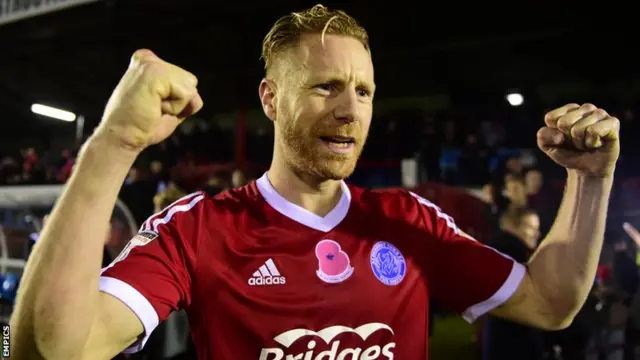 Aldershot goalscorer Mark Molesley celebrates