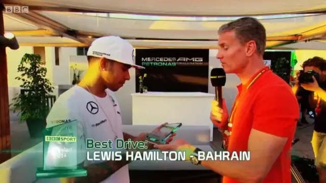 Lewis Hamilton with the award for drive of the year