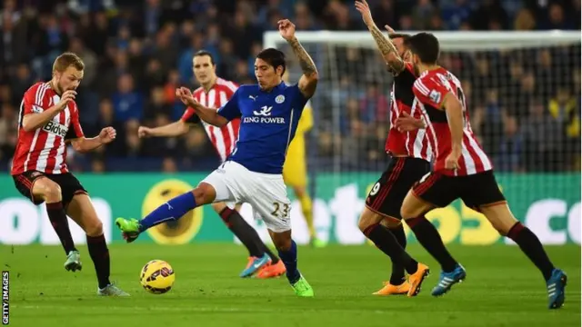 Leonardo Ulloa on the ball