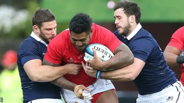 Ross Ford tackles Tonga"s centre Hemani Paea