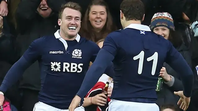 Scotland"s full back Stuart Hogg celebrates scoring his try with Scotland"s wing Tim Visser