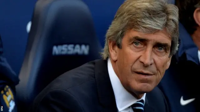 Manuel Pellegrini looks on