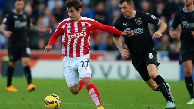 Stoke playmaker Bojan takes on the Burnley defence