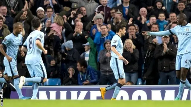 Manchester City players celebrate