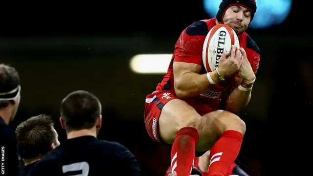 Leigh Halfpenny collects the ball for Wales