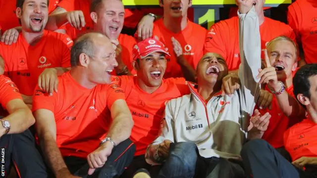 SAO PAULO, BRAZIL - NOVEMBER 02: New Formula One World Champion Lewis Hamilton of Great Britain and McLaren Mercedes (C) celebrates with his half-brother Nick Hamilton (L) and his Team Principal Ron Dennis (L)