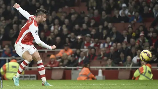 Arsenal striker Olivier Giroud scores