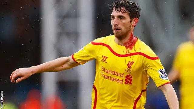 Liverpool's Joe Allen suffers a cut to his head