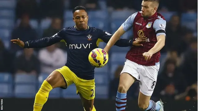 Nathaniel Clyne challenges Tom Cleverley