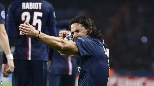 Paris St-Germain forward Edinson Cavani celebrates scoring against Ajax