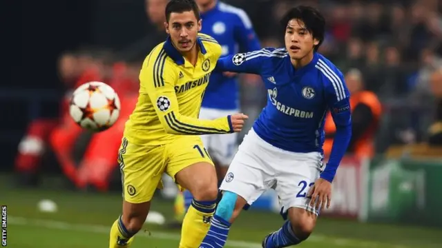 Eden Hazard battles for possession