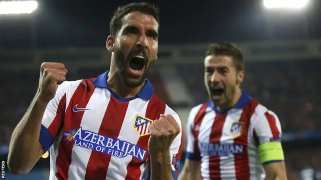 Raul Garcia celebrates for Atletico Madrid