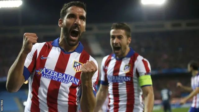 Raul Garcia celebrates for Atletico Madrid