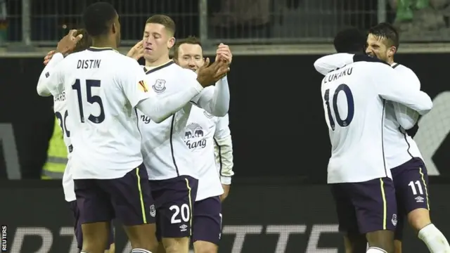 Everton celebrate their second against Wolfsburg