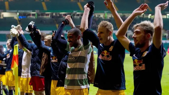 Salzburg celebrate their 3-1 victory at Celtic Park