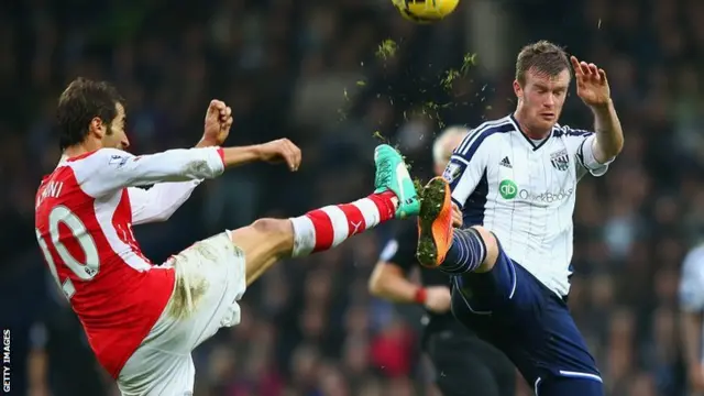 Mathieu Flamini of Arsenal and Craig Gardner of West Brom