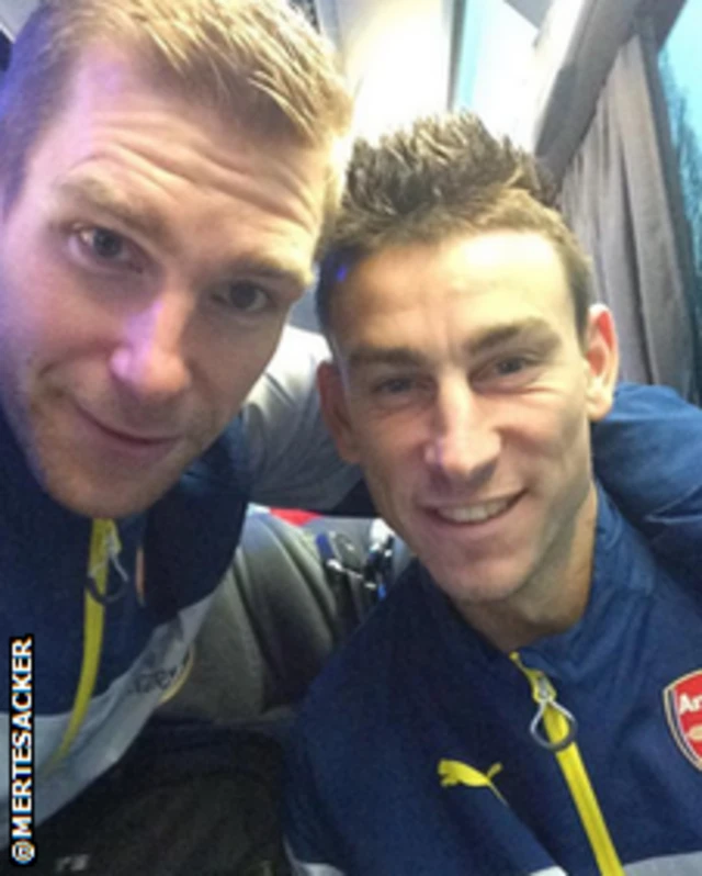 Per Mertesacker and Laurent Koscielny