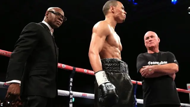 Chris Eubank Junior (centre) with his father