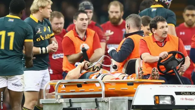 Jean De Villiers stretchered off against Wales